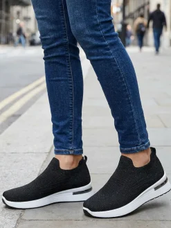 Maira Sneakers donna slip on in maglia con zeppa - nero