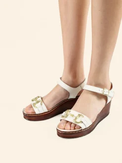 Nakoa Sandali donna in pelle con zeppa e plateau