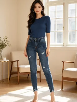 New Collection Jeans slim fit con strappi da donna