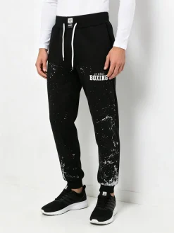 Xtreme Boxing Pantaloni tuta da uomo felpati con polsini - nero